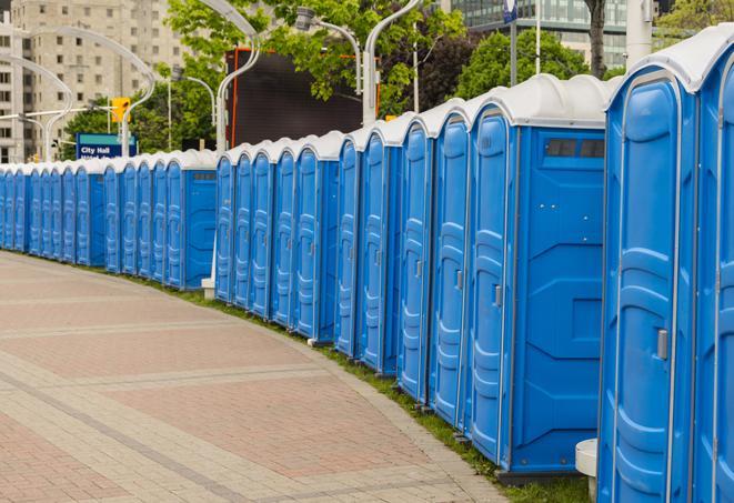 a line of portable restrooms at a sporting event, providing athletes and spectators with clean and accessible facilities in Amboy WA